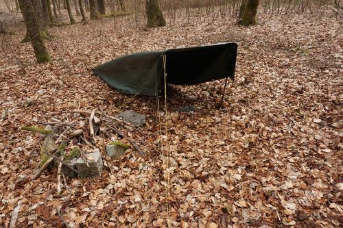 My tarp stretched up with two hiking poles.